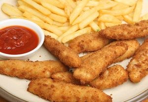 Chicken and fries on plate